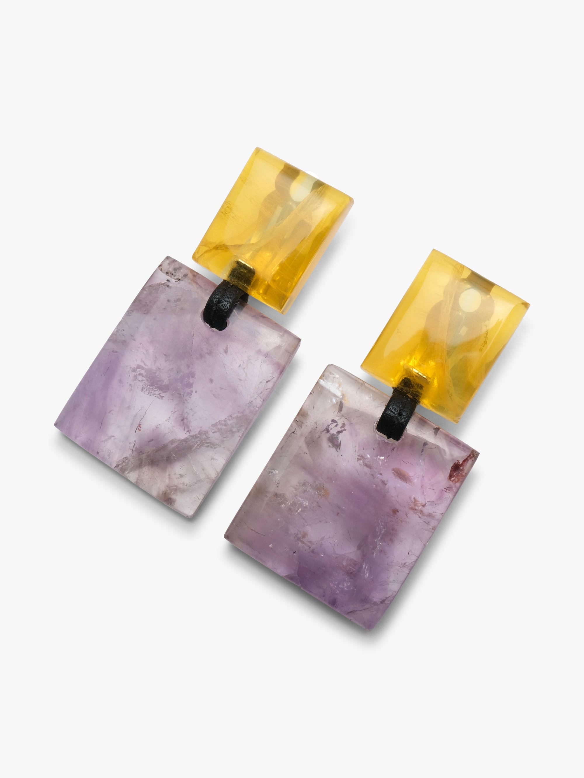 Earrings made of a small yellow square and a larger purple square underneath, displayed on a white background.