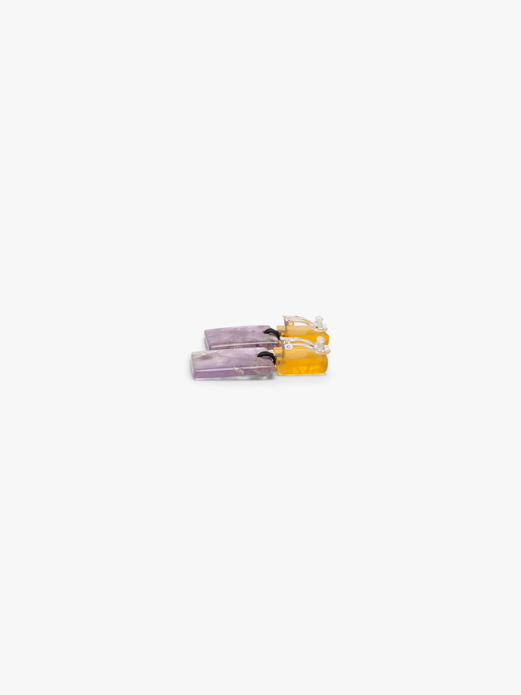 Earrings made of a small yellow square and a larger purple square underneath, displayed on a white background.