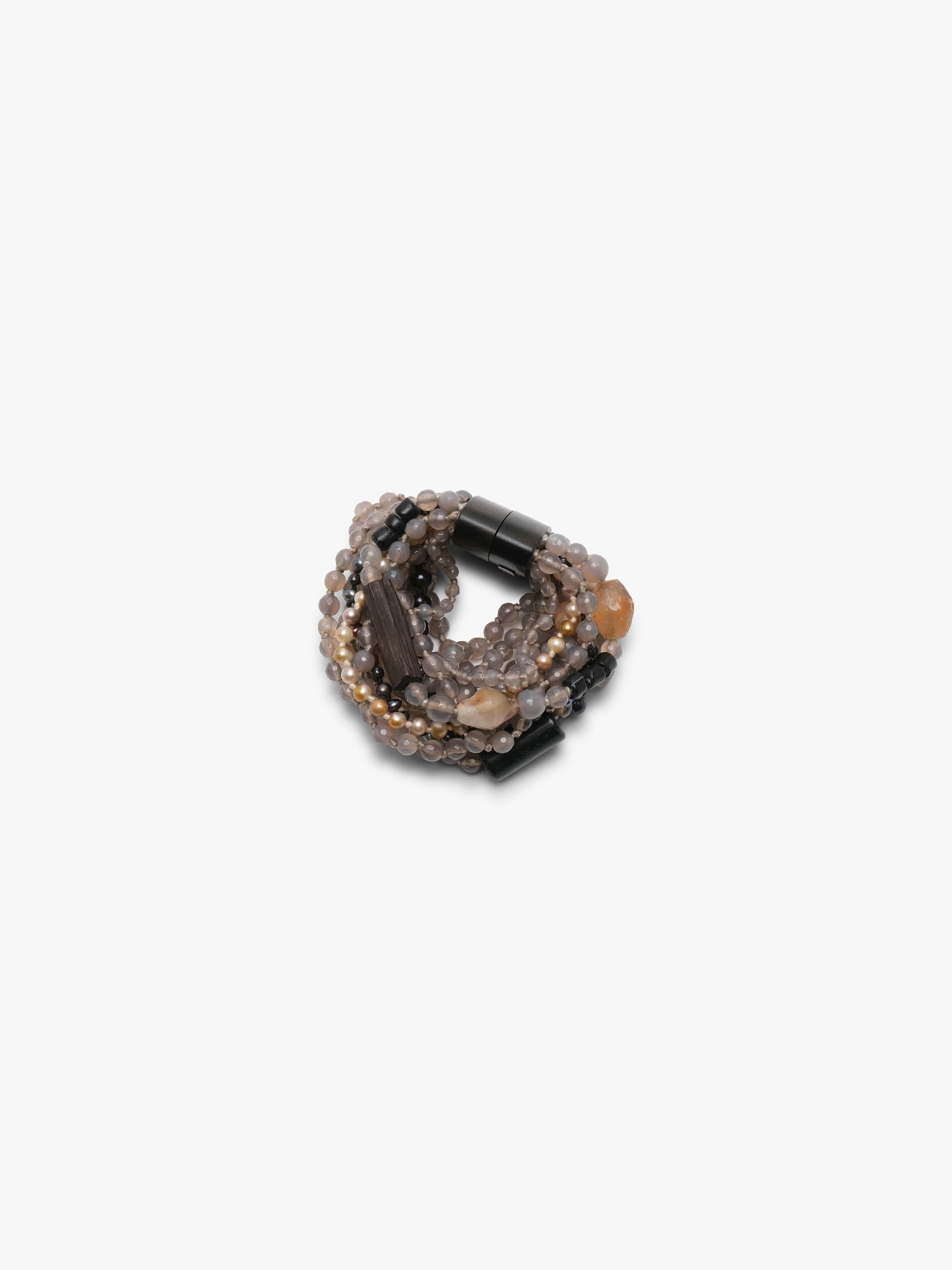Multistrand bracelet in grey, beige and orange colours. Placed on a white background.