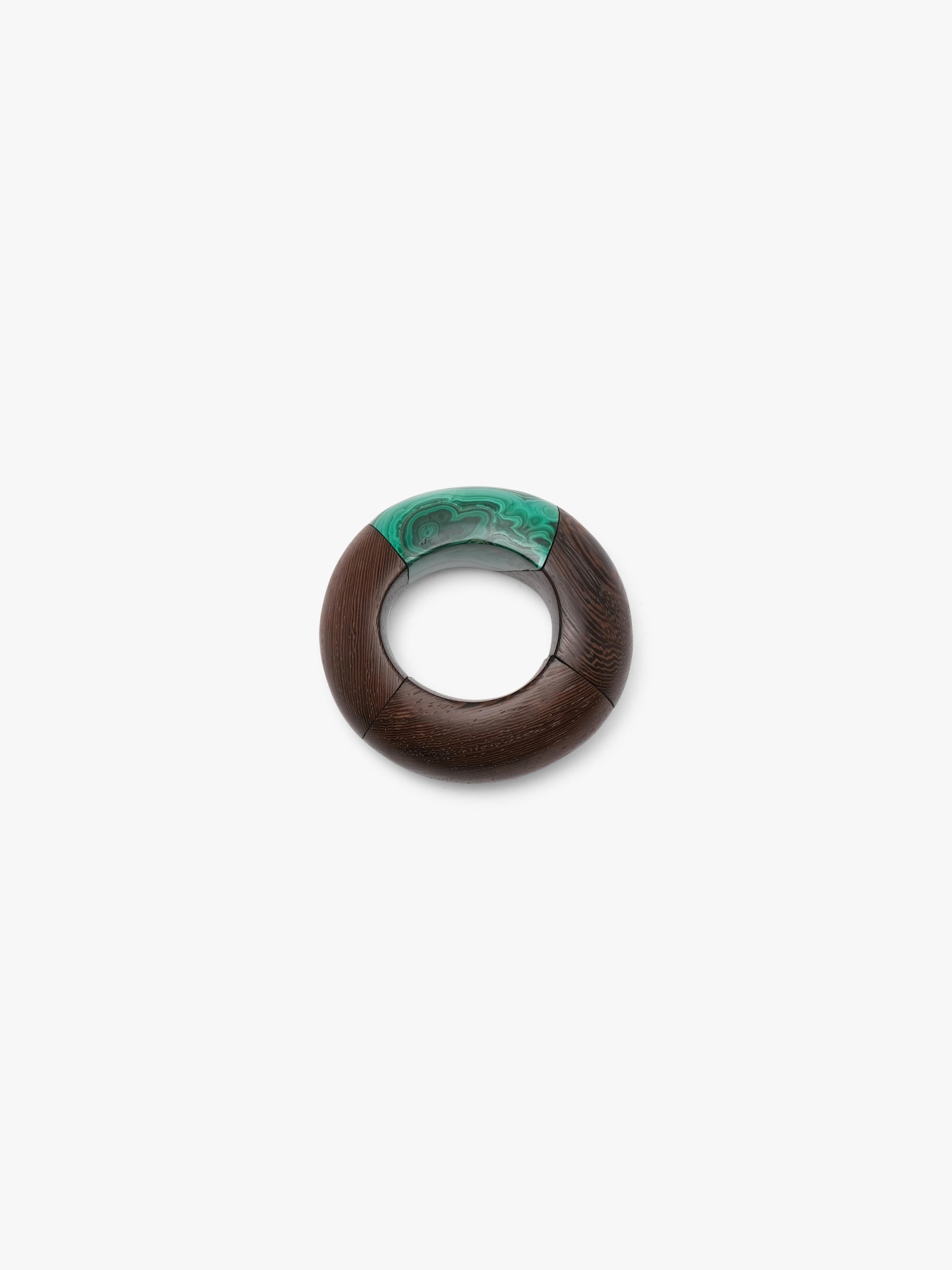 Brown and green bracelet on a white background