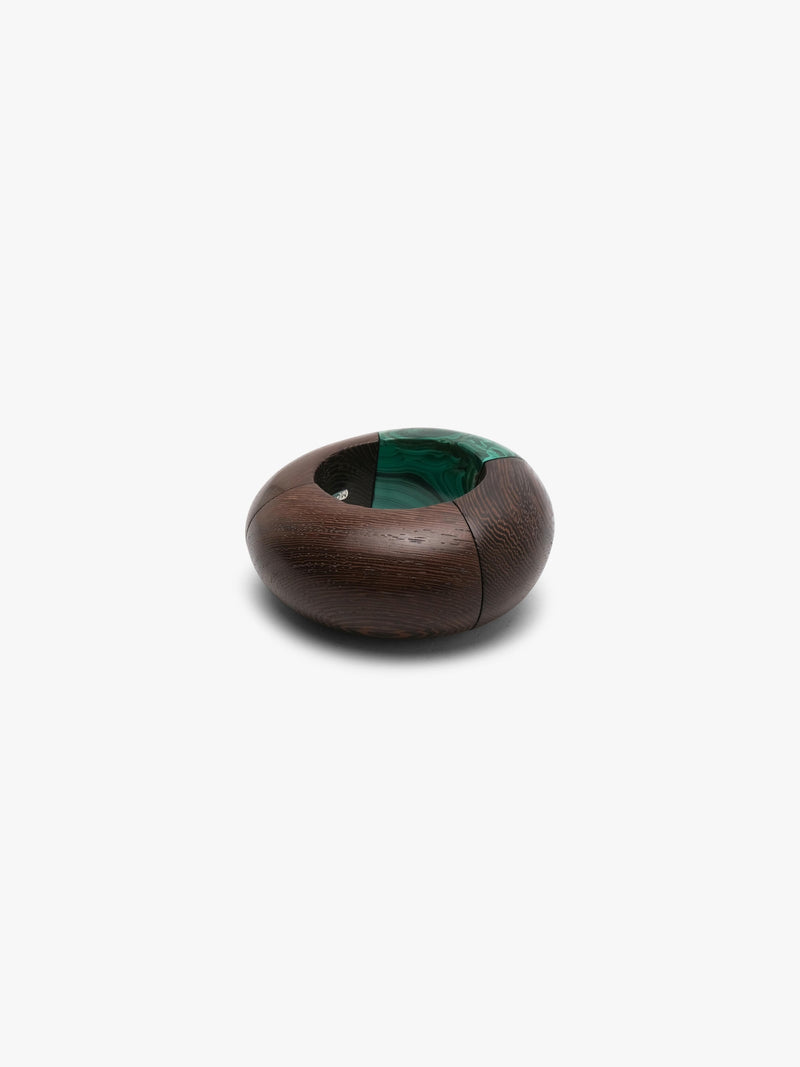 Brown and green bracelet on a white background