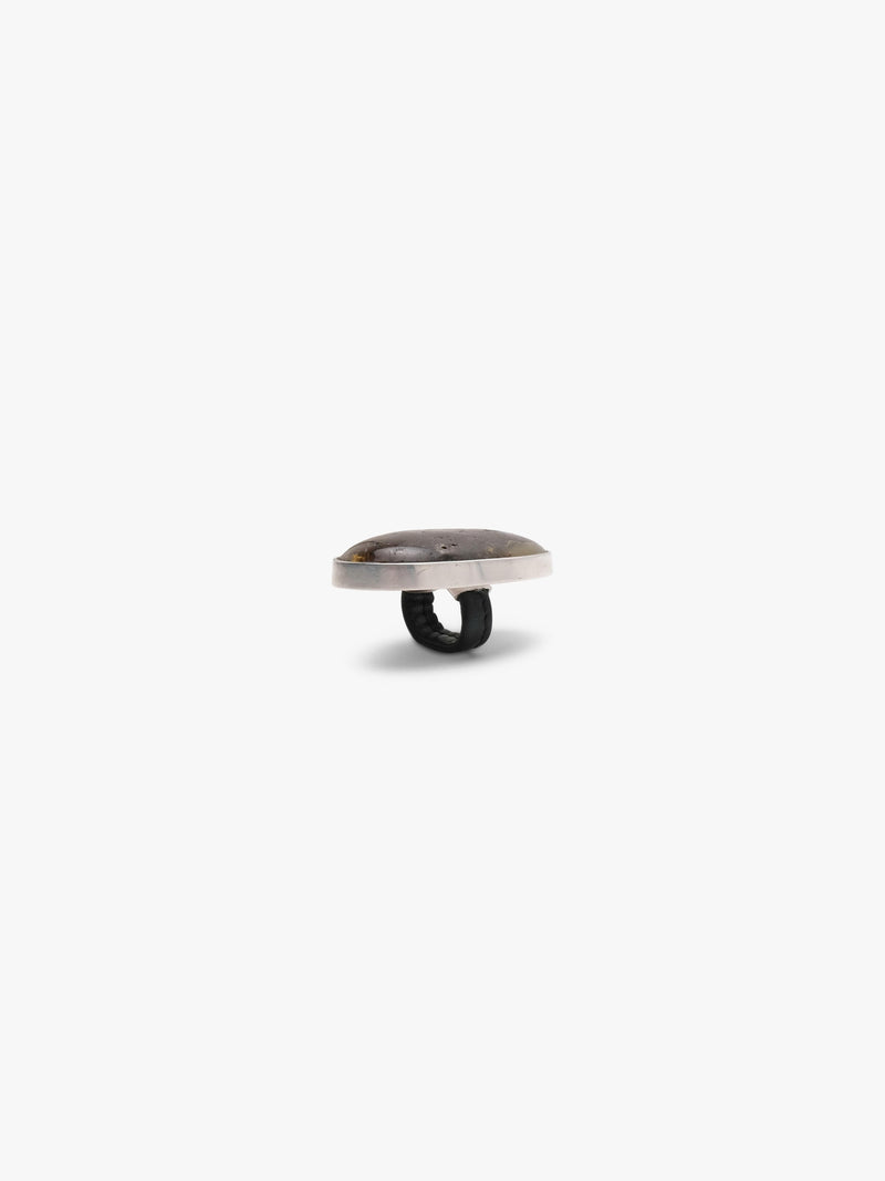 Ring: amber, sterling silver, leather