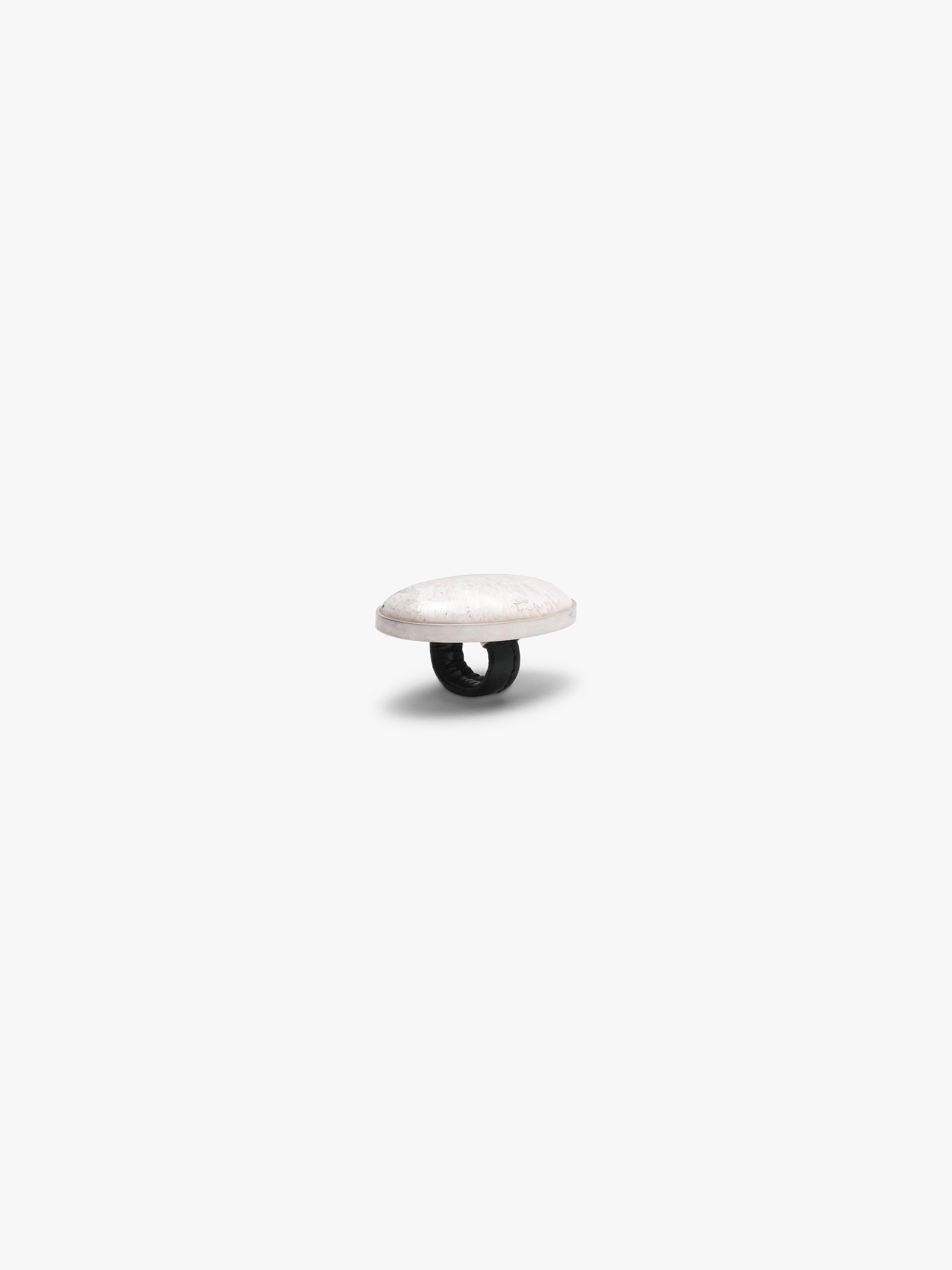 Ring: scolotite, sterling silver, leather