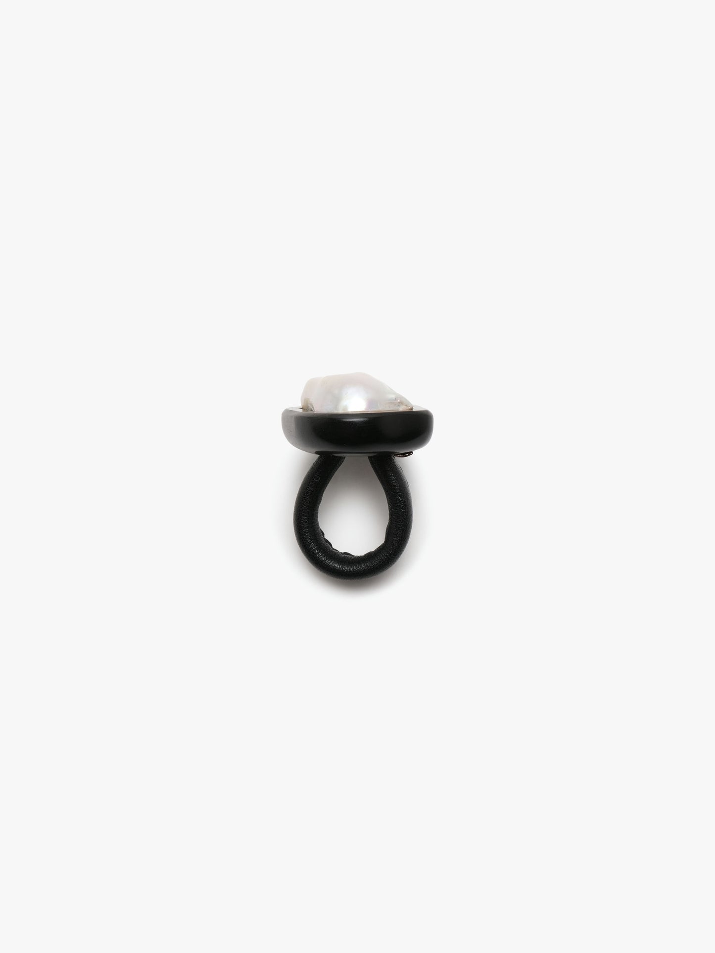 Ring: baroque pearl, ebony, leather