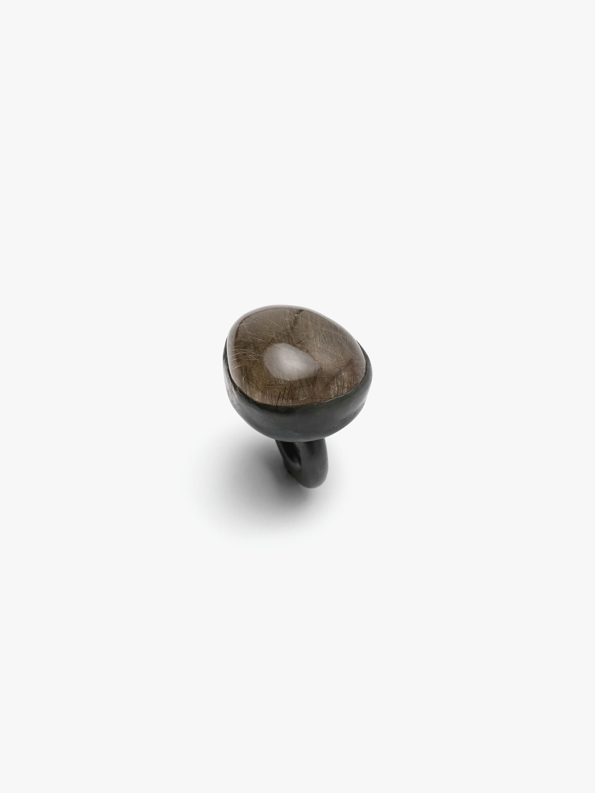 Ring with a stone on a white background