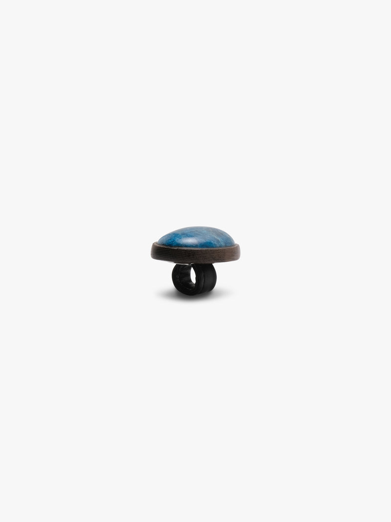 Blue oval stone ring on a white background