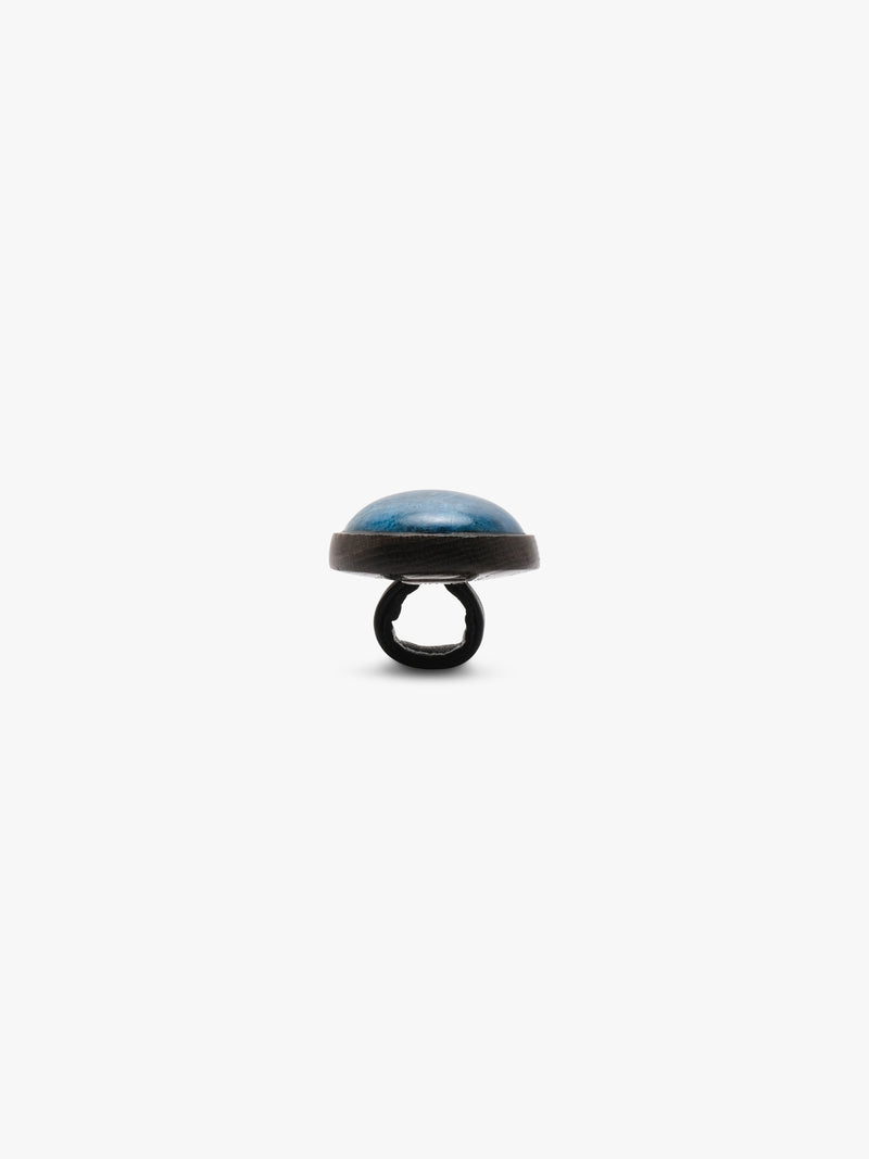 Blue oval stone ring on a white background