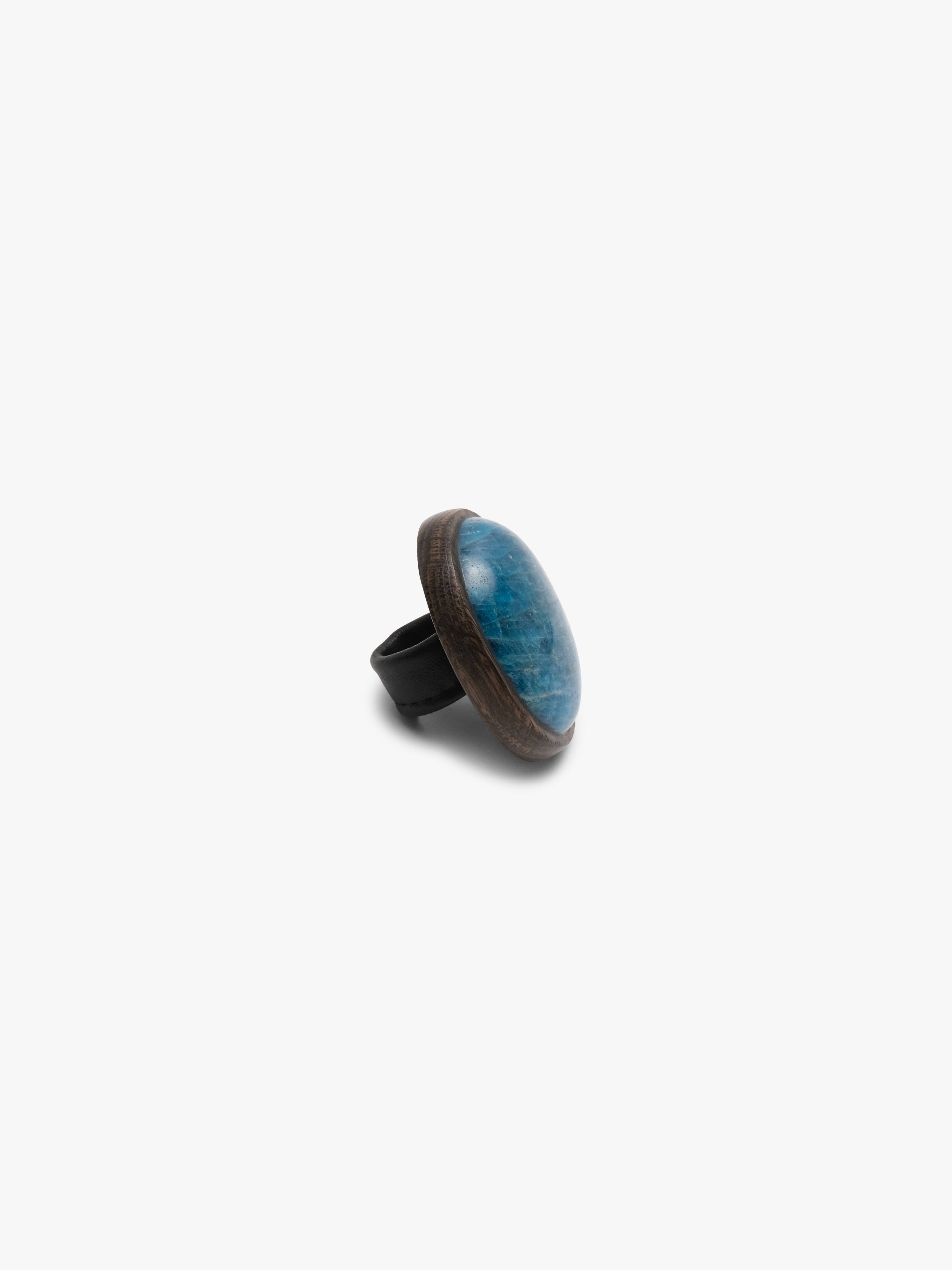 Ring: apatite, bog oak, leather