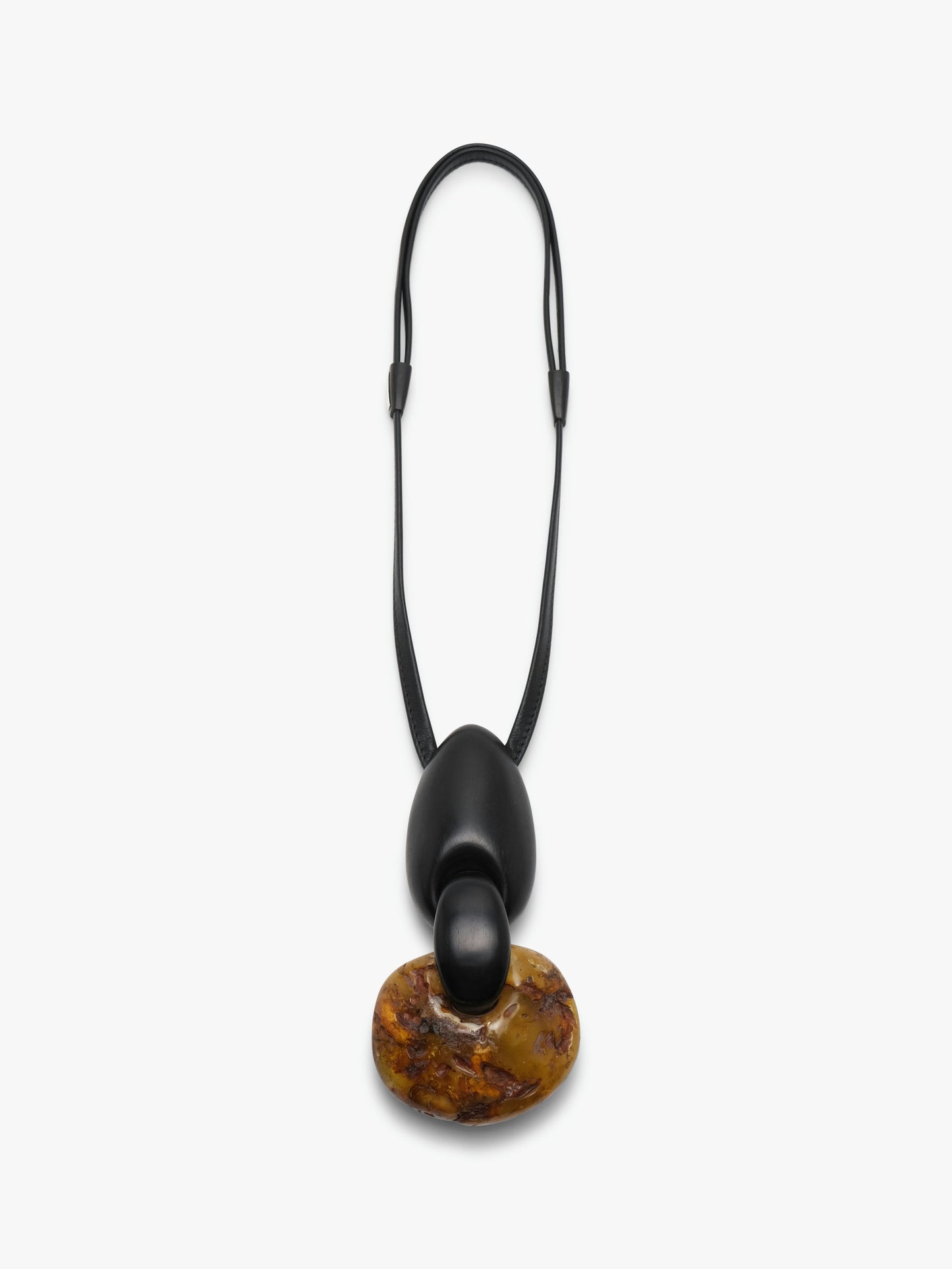 Pendant: amber, ebony, leather