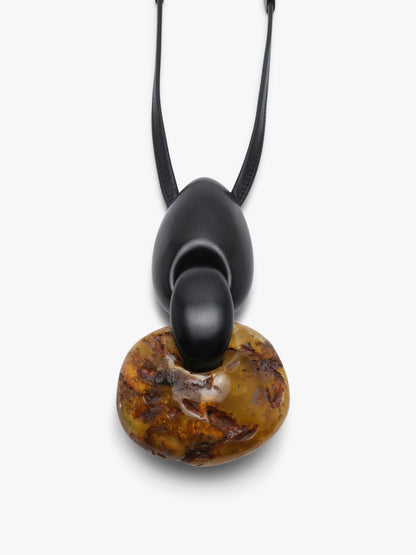 Pendant: amber, ebony, leather