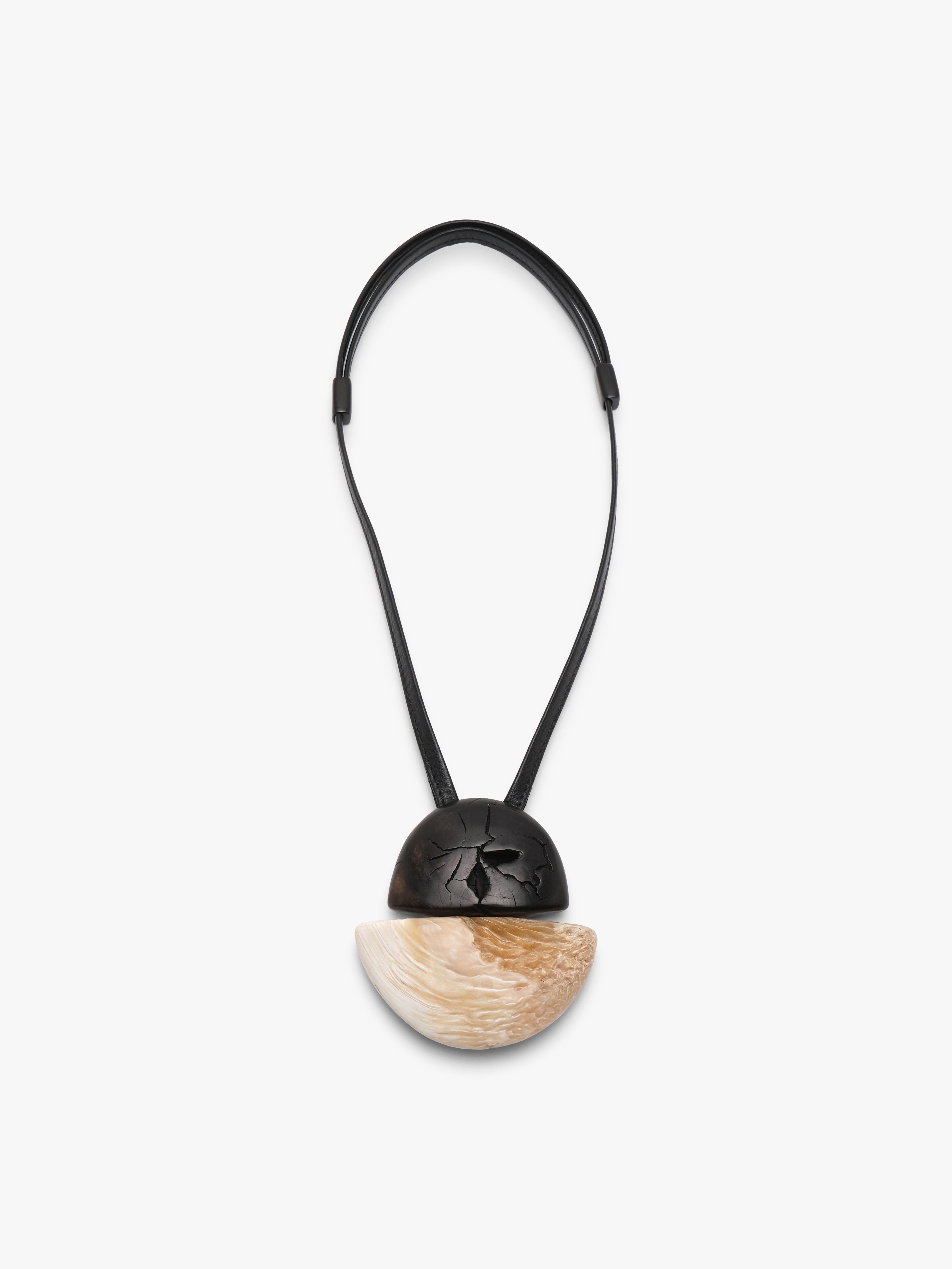 Pendant: ebony, musk ox horn