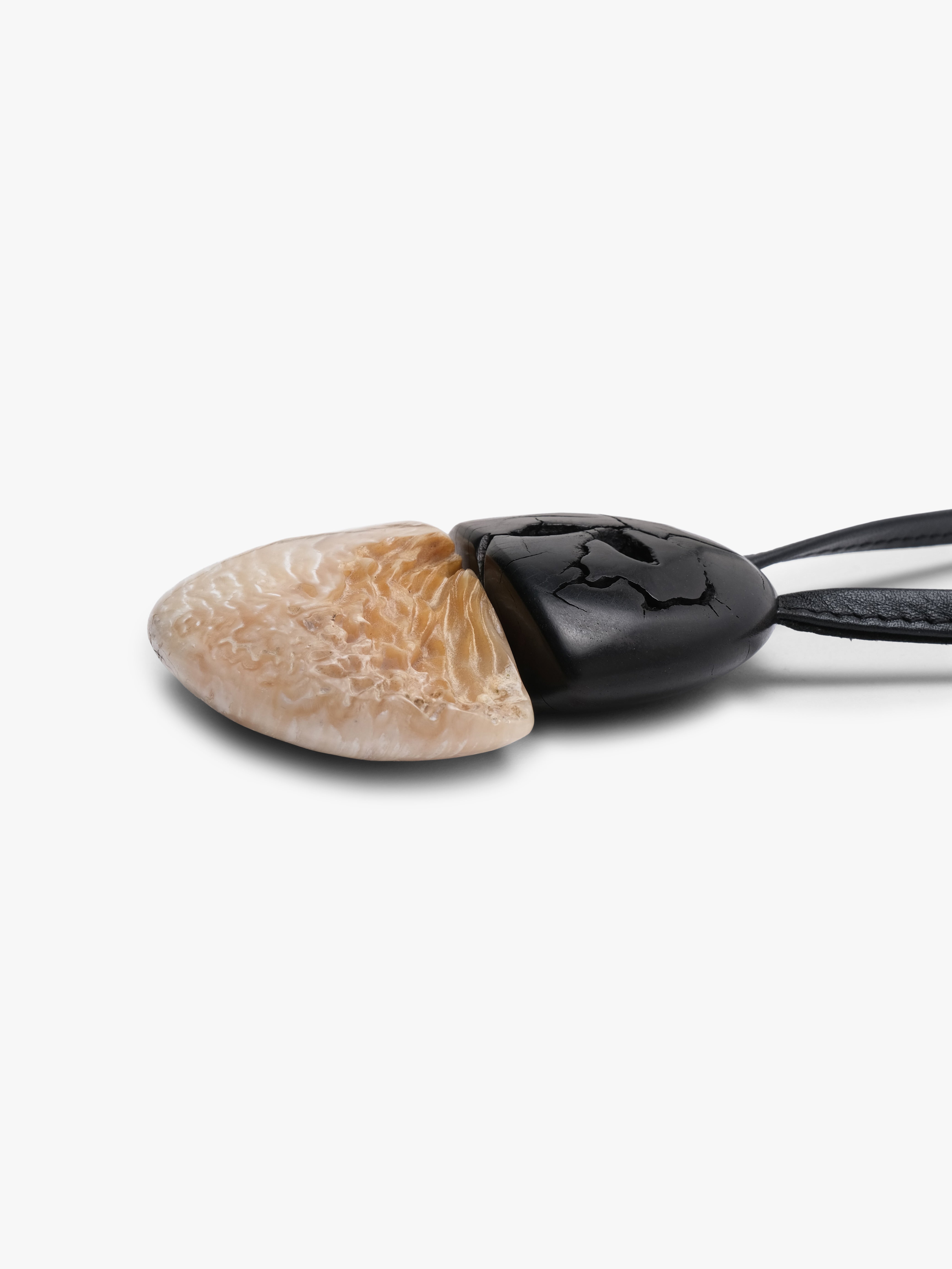 Pendant: ebony, musk ox horn