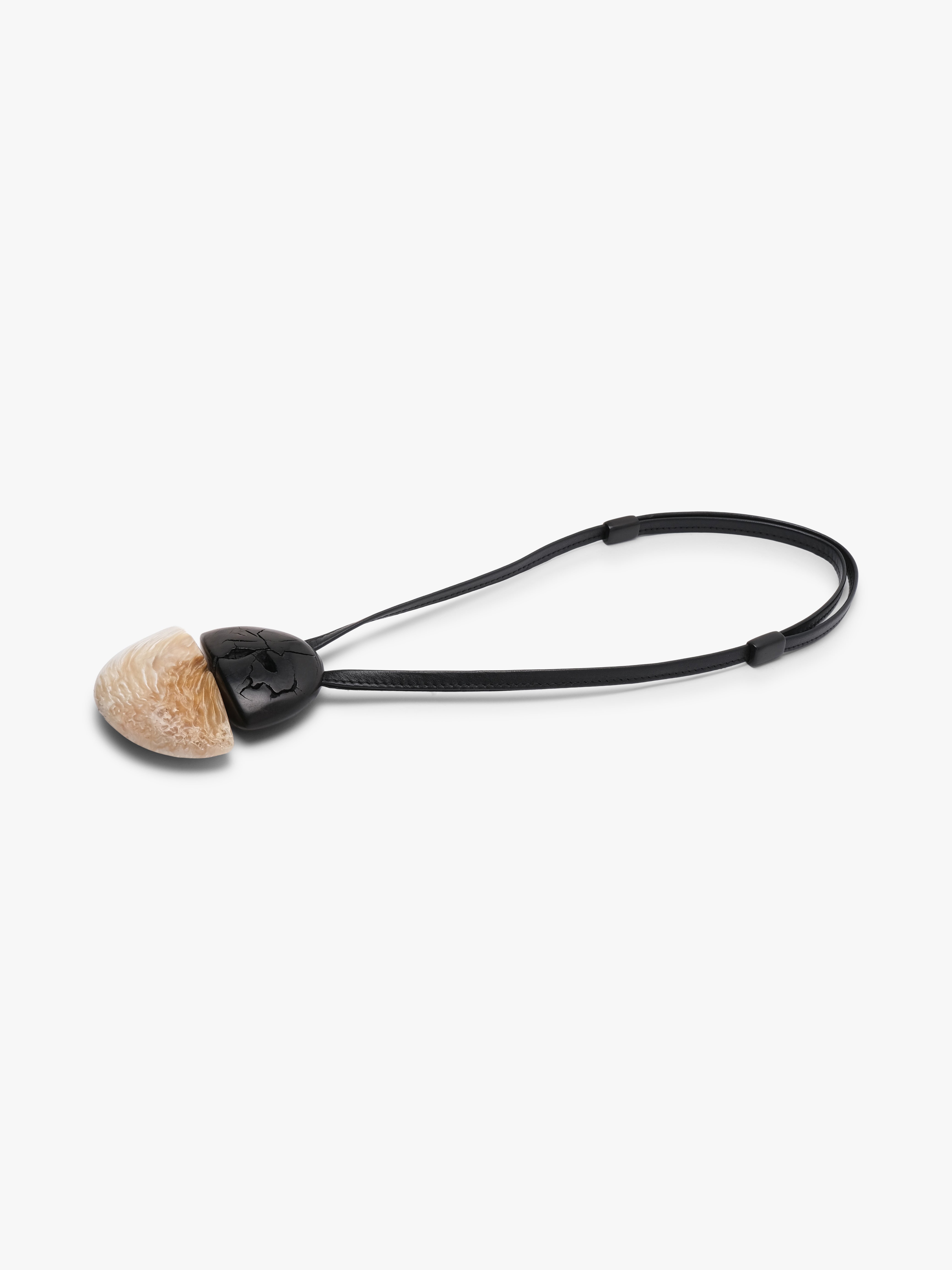 Pendant: ebony, musk ox horn