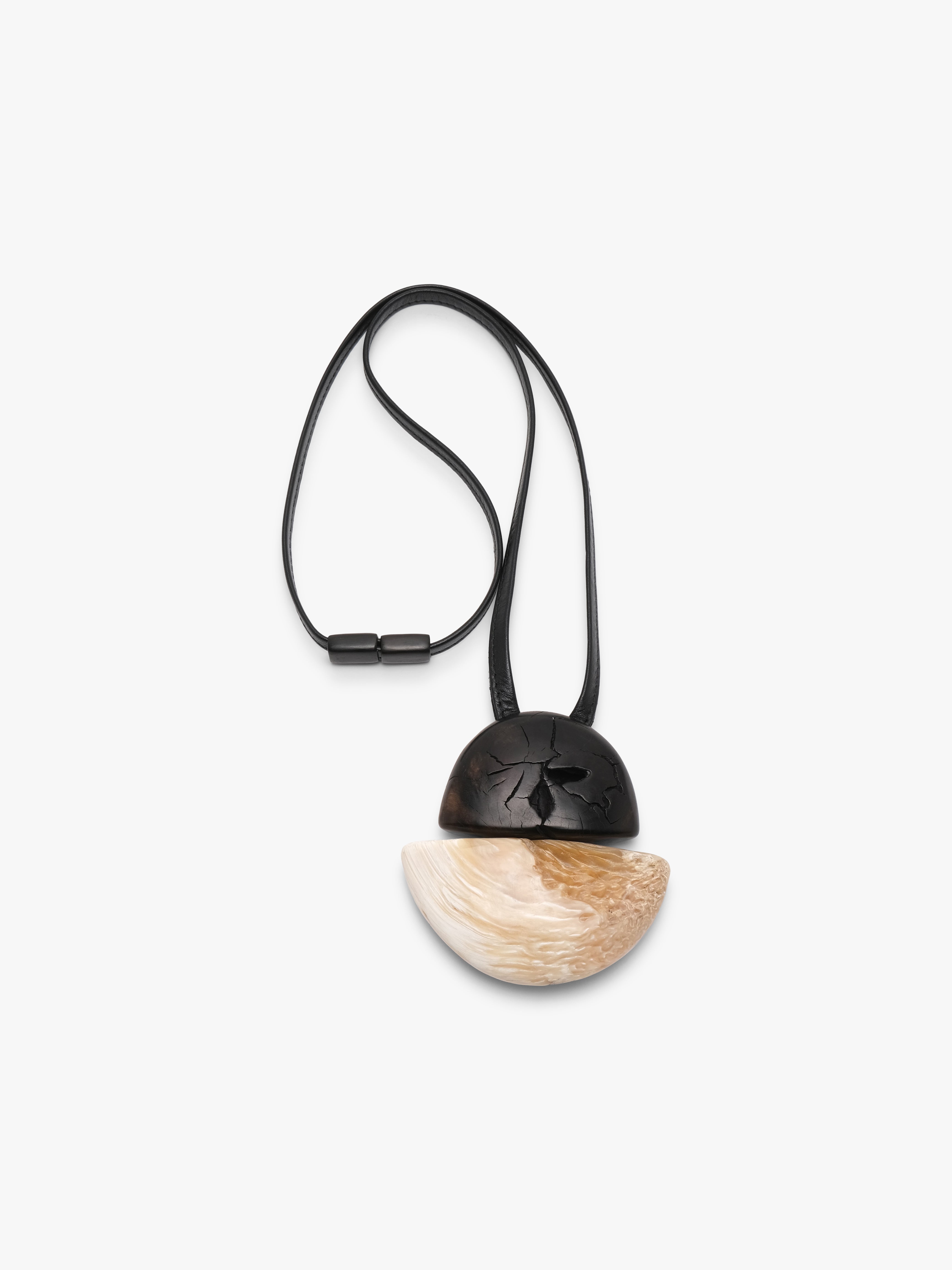 Pendant: ebony, musk ox horn