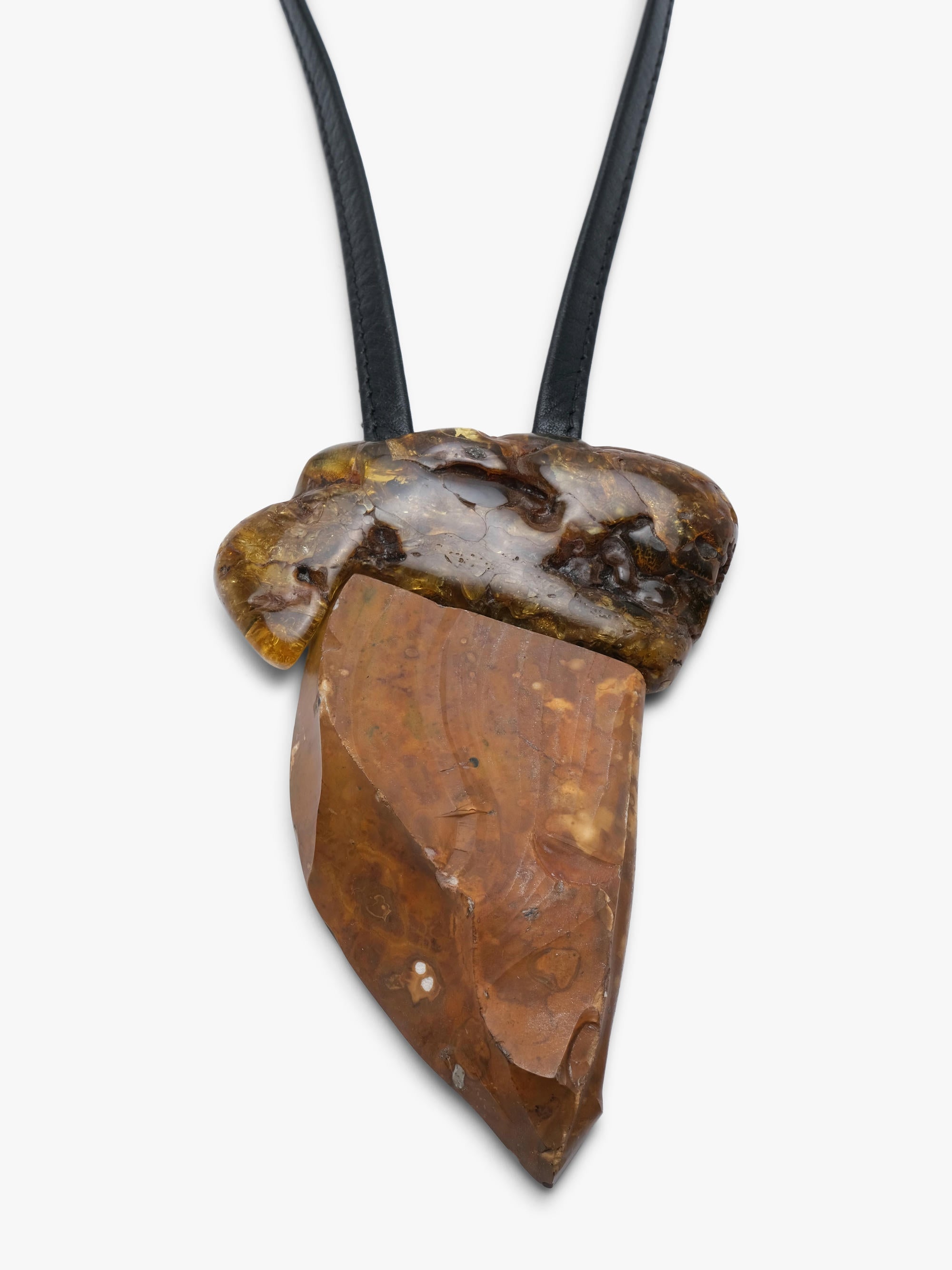 Pendant in amber and flint