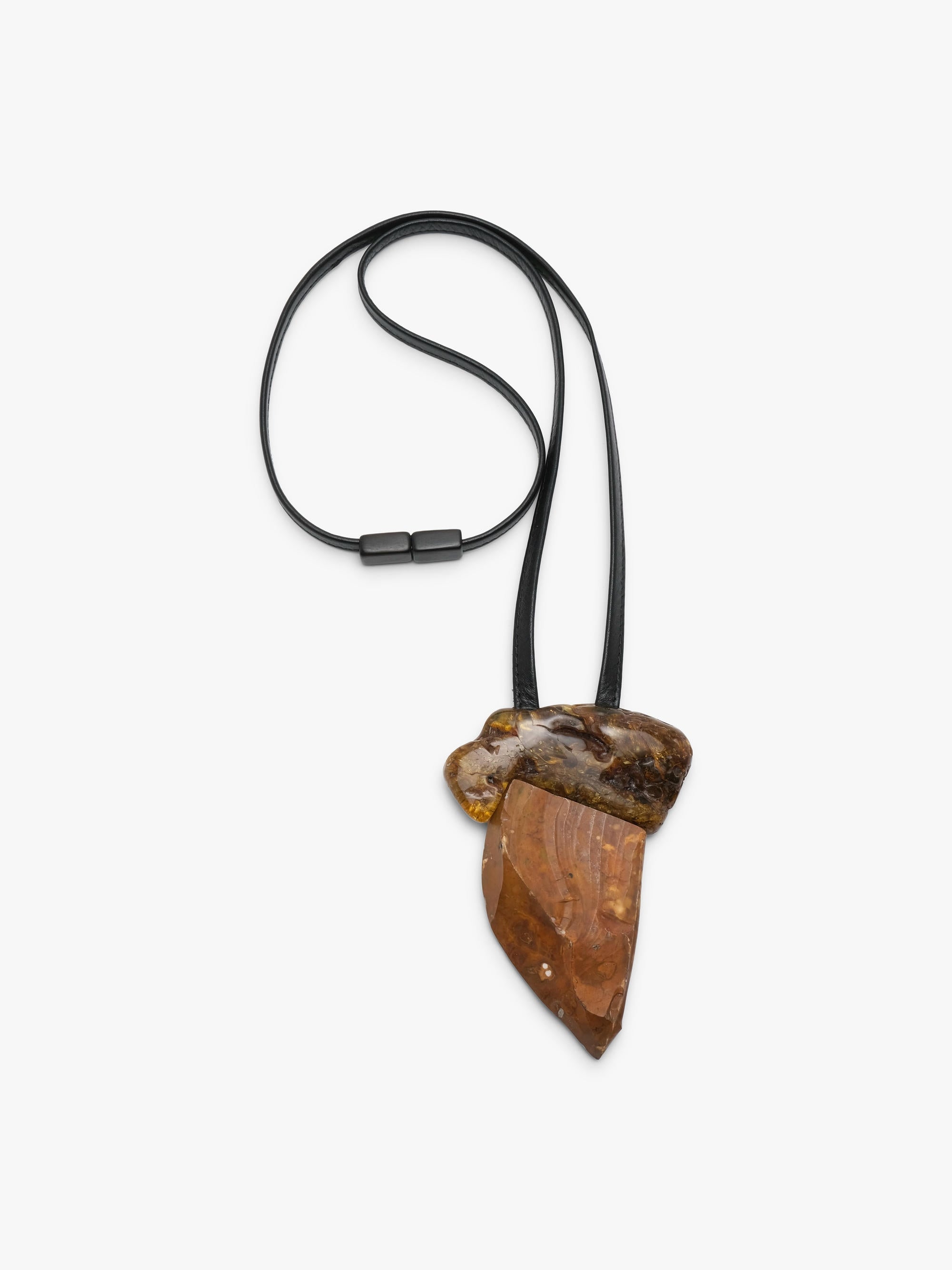 Pendant in amber and flint