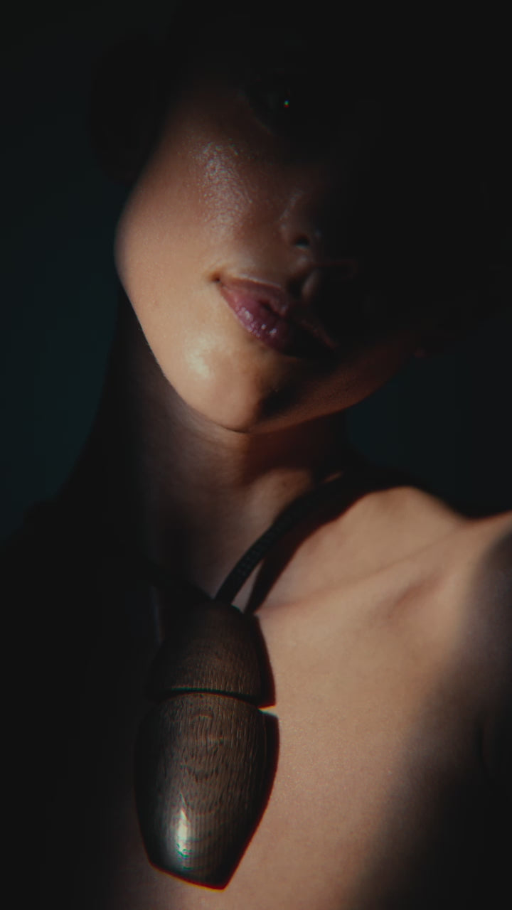 Lira pendant: bog oak, leather