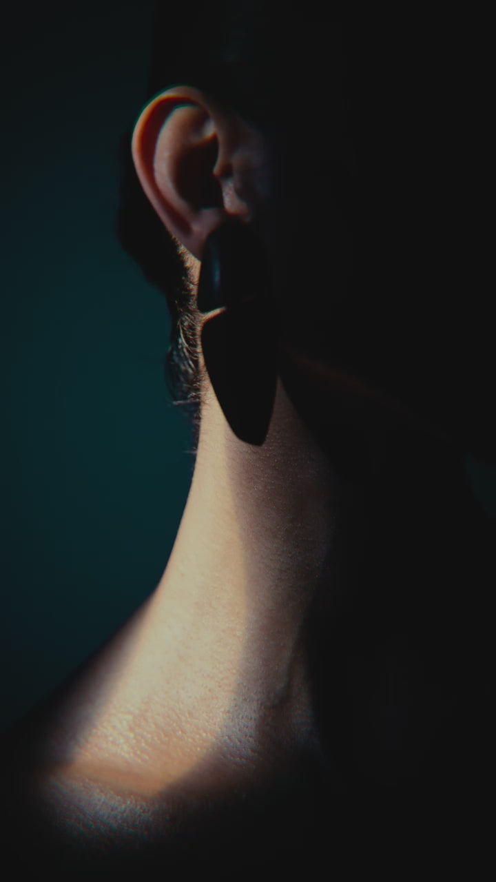 Ara earring: bog oak