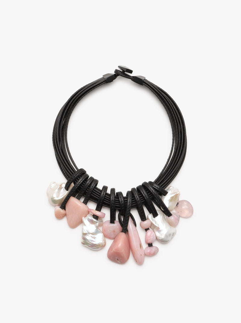 A black leather necklace with freshwater pearls and Andean opal accents.