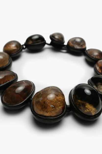 Necklace: Black oak and quartz