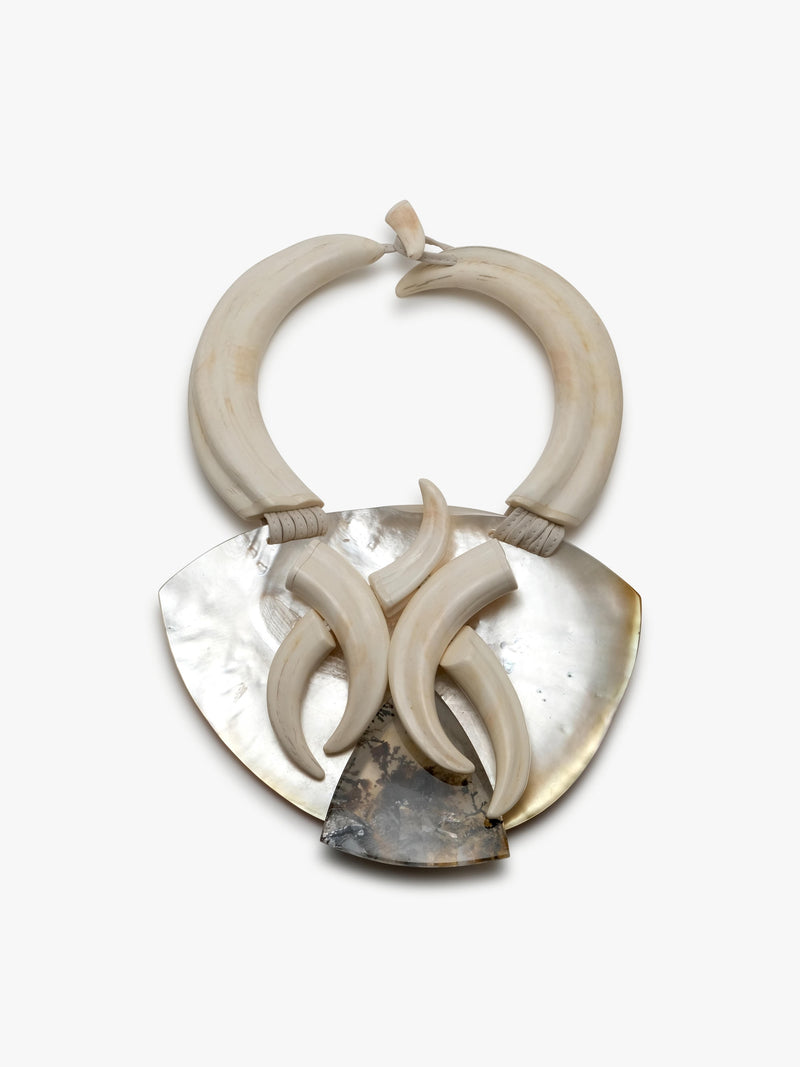 Necklace: mother of pearl, garden quartz, warthog tooth