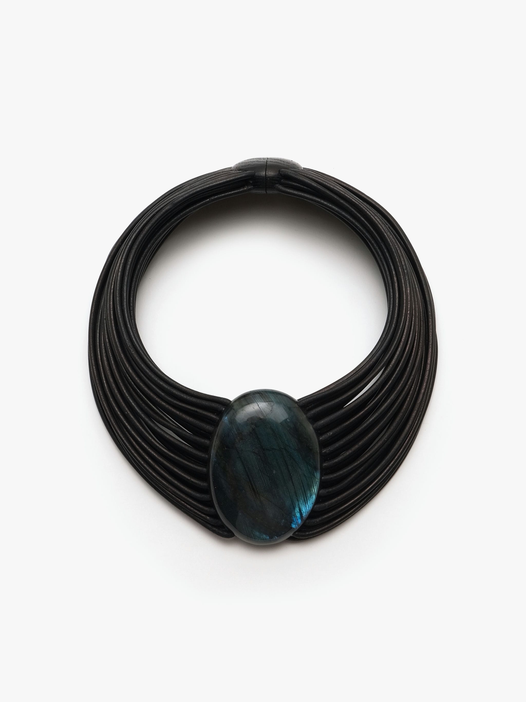 A black leather necklace with a central labradorite stone and a bog oak magnetic lock.