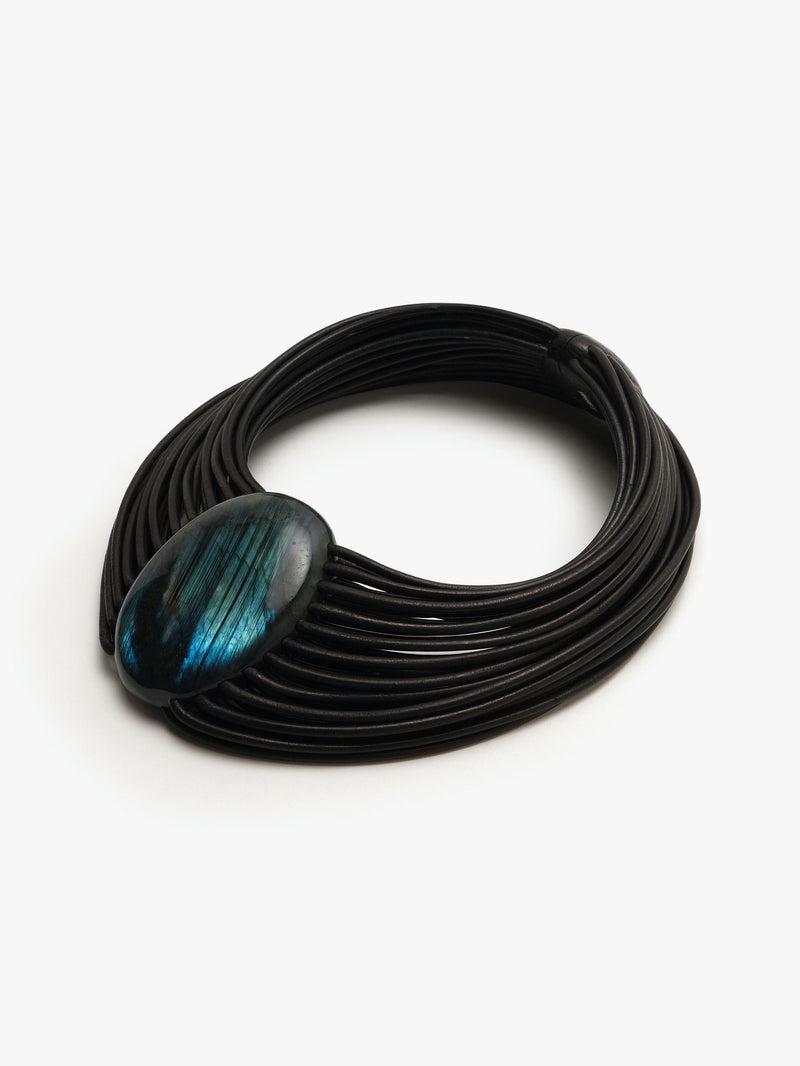 A black leather necklace with a central labradorite stone and a bog oak magnetic lock.