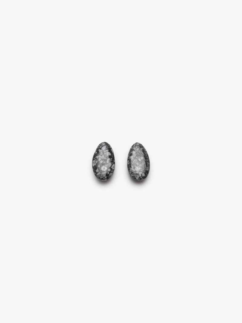 grey stone earring with grey, white and black accents on a white background