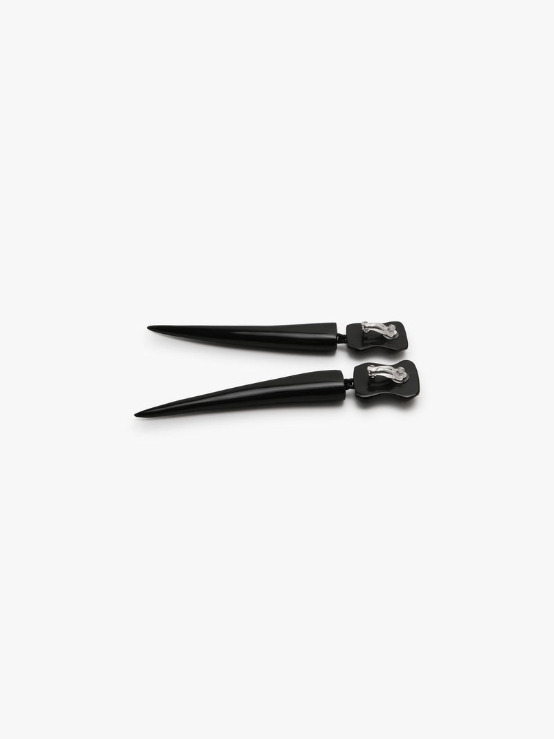 black long earrings on a white background