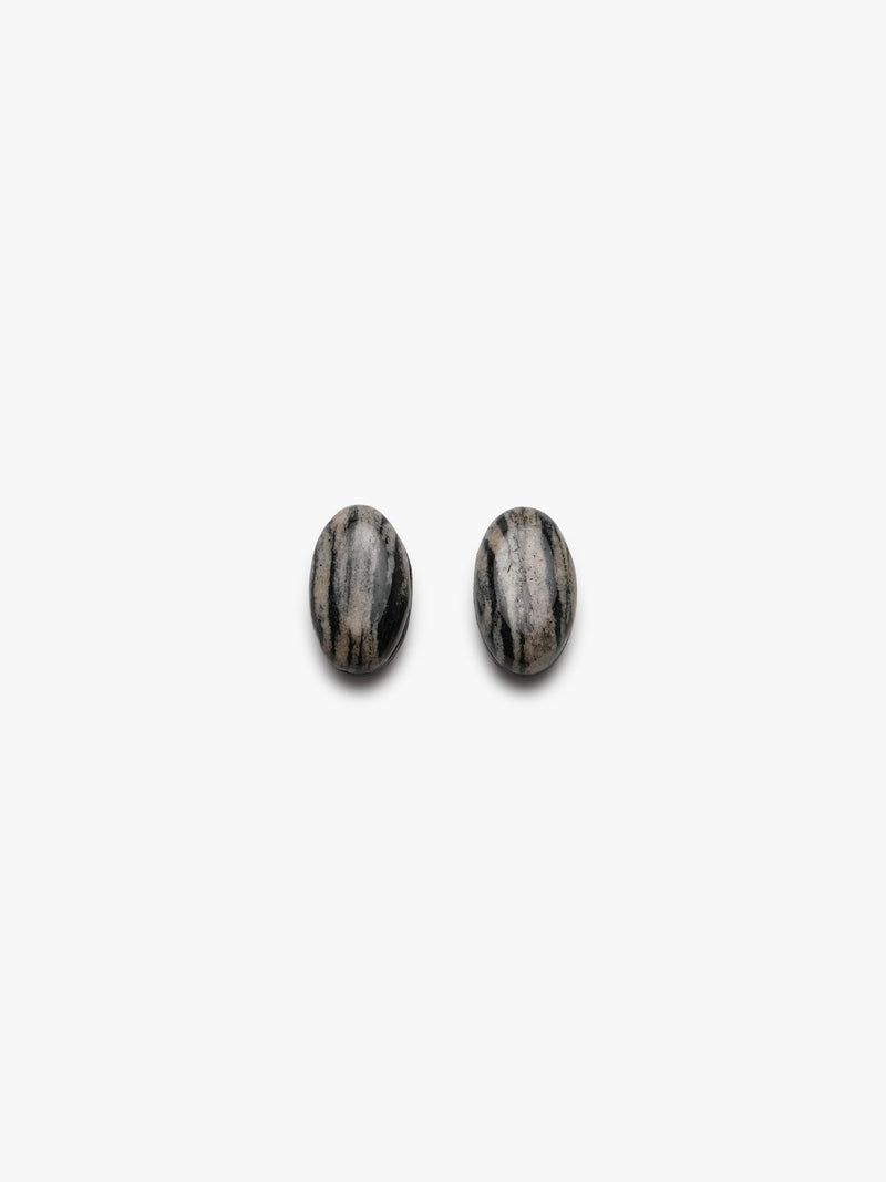 two striped earrings in natural stone on a white background