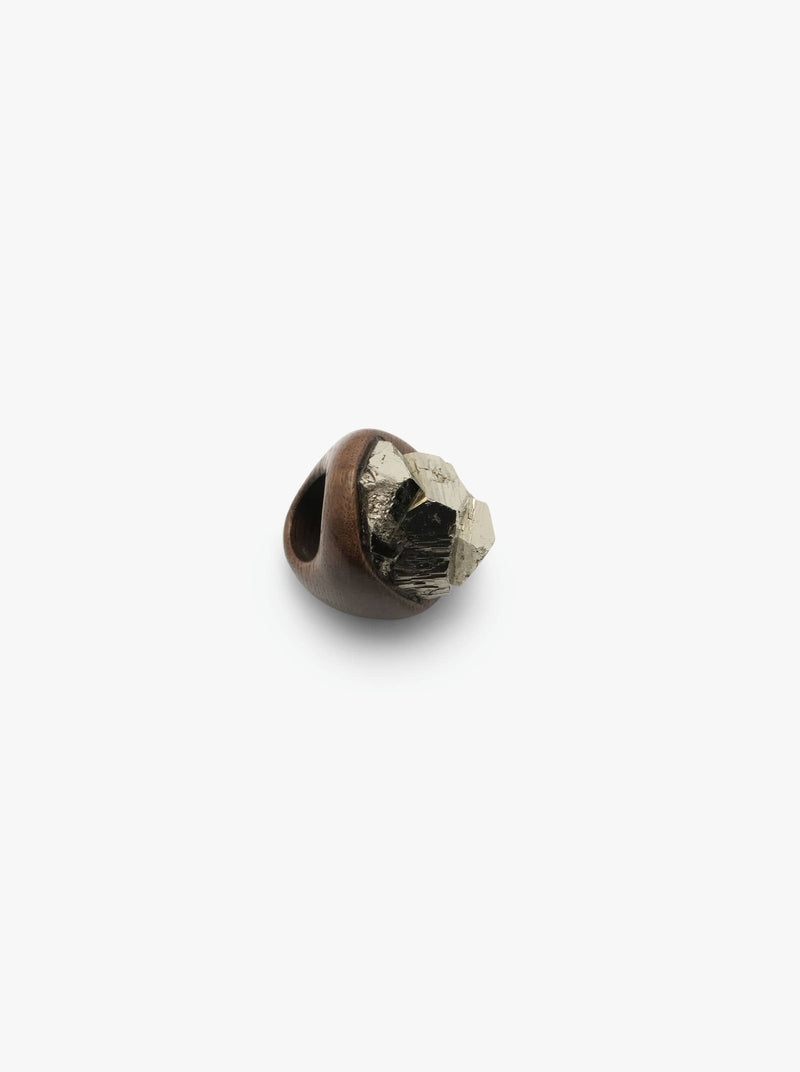 Ring with pyrite and bog oak on a white background