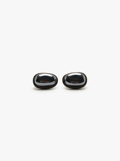 Cuff link: hematite, bog oak