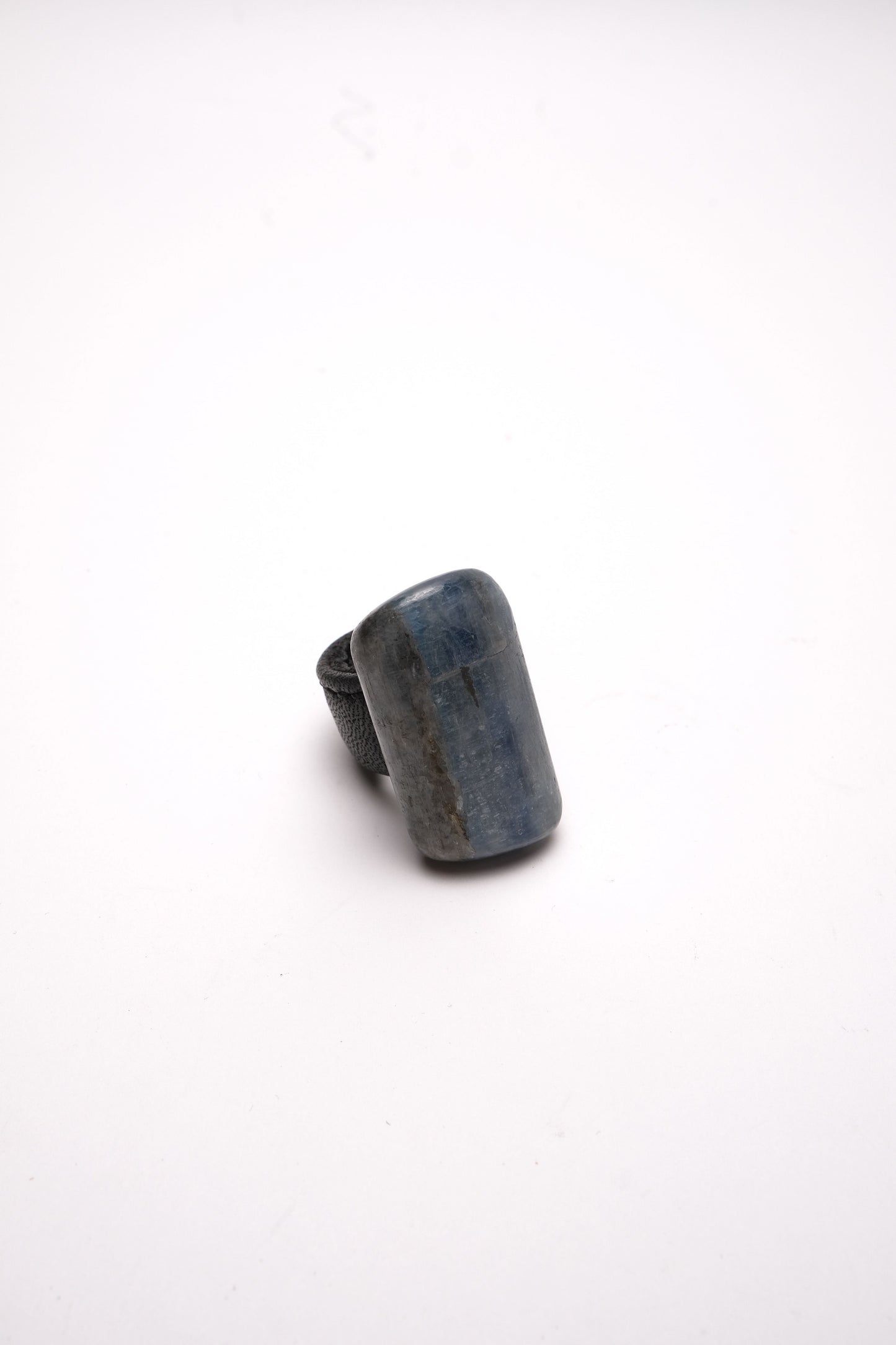 Ring: blue apatite, leather