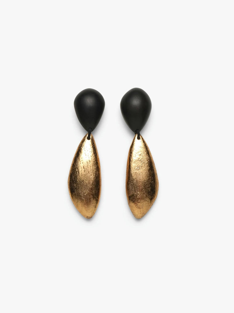 A pair of earclips with the upper part in black and lower part in gold tone against a white background.
