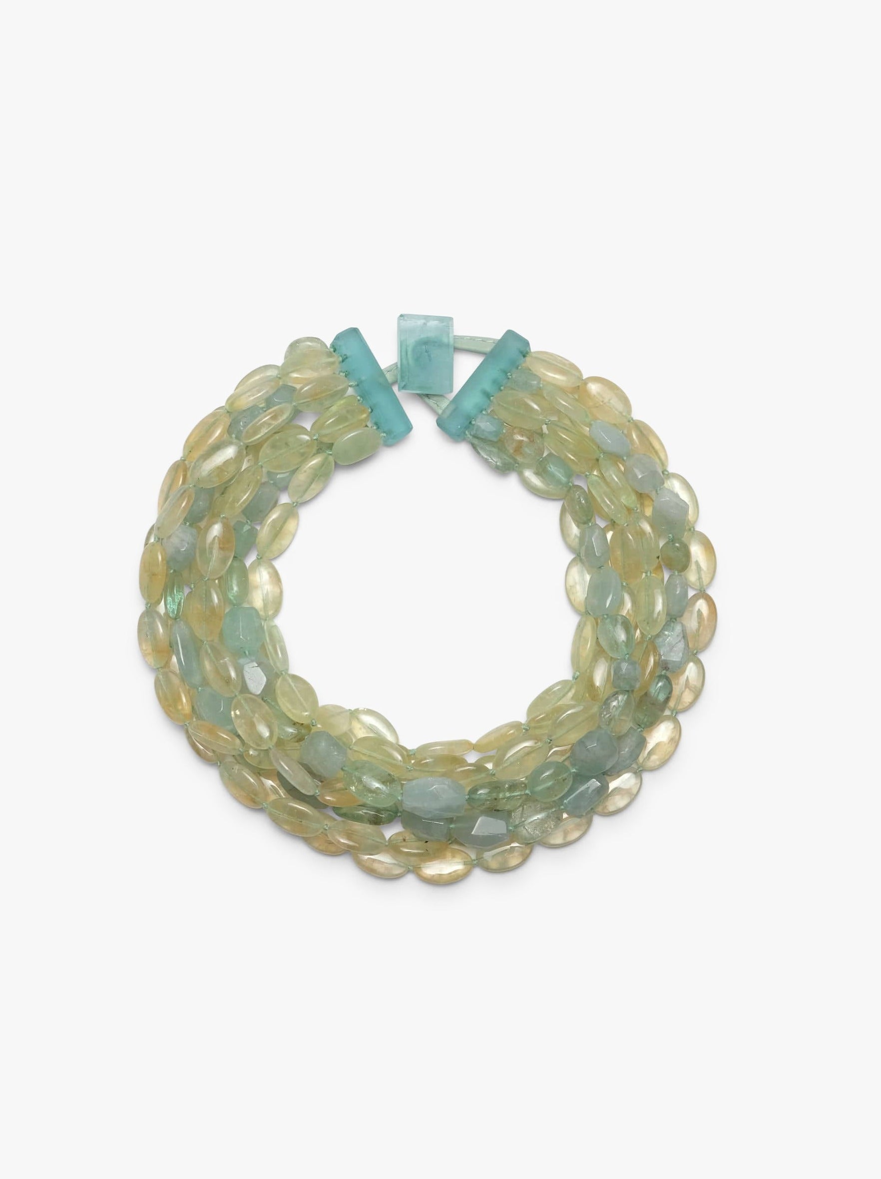 A green and blue beaded necklace with aquamarine and prehnite stones, featuring toggle clasps.